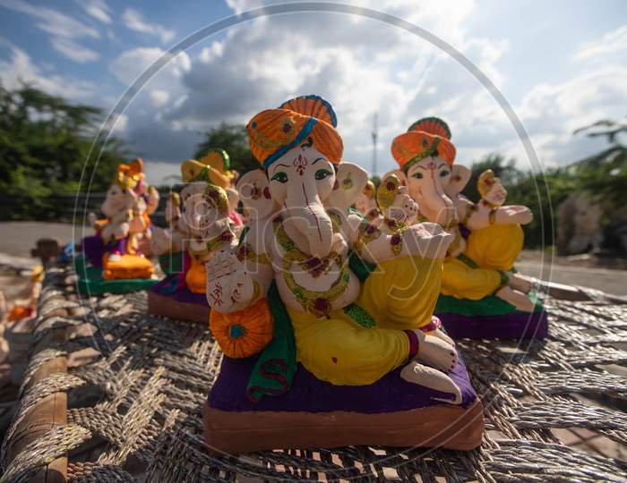 Idols of Ganesha, displayed for sale during Ganesh Chaturthi along the roadside in New Delhi on August 22, 2020.