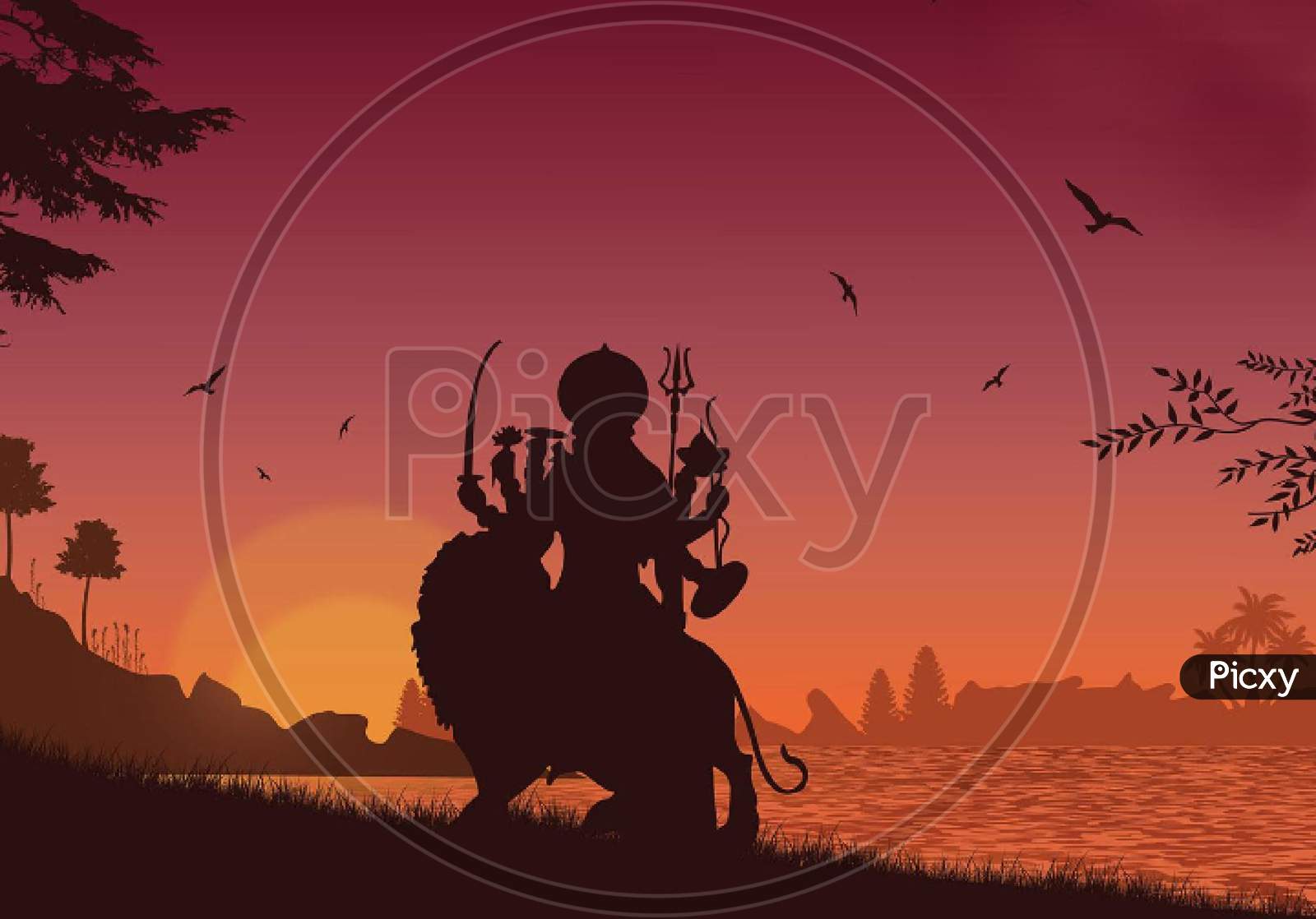 Durga devi silhouette in sunset
