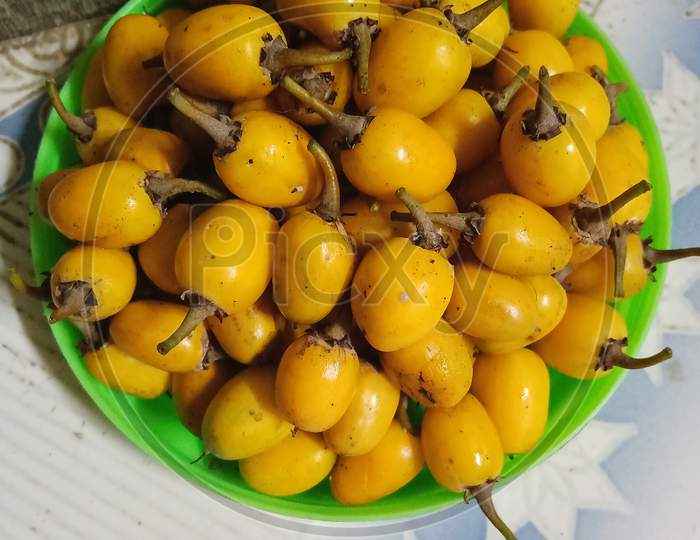 Rajan, Ranjana (small golden yellow fruits)