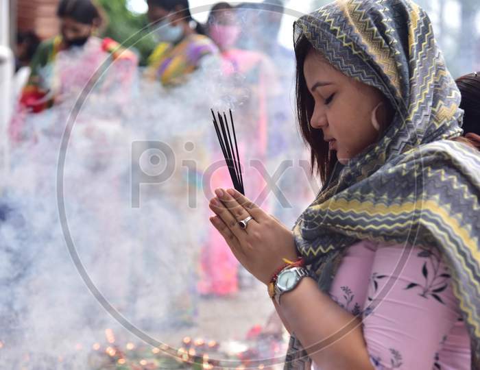 Devotees  Offer Prayers To Lord Ganesha On The Occasion Of  Ganesh Chaturthi Festival In Nagaon District Of Assam On August 22,2020.