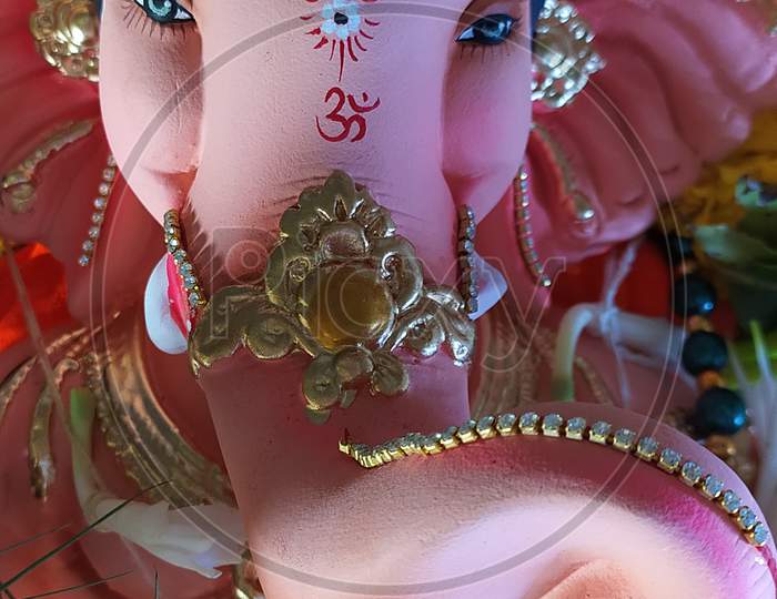A closeup face shot of Lord Ganesha