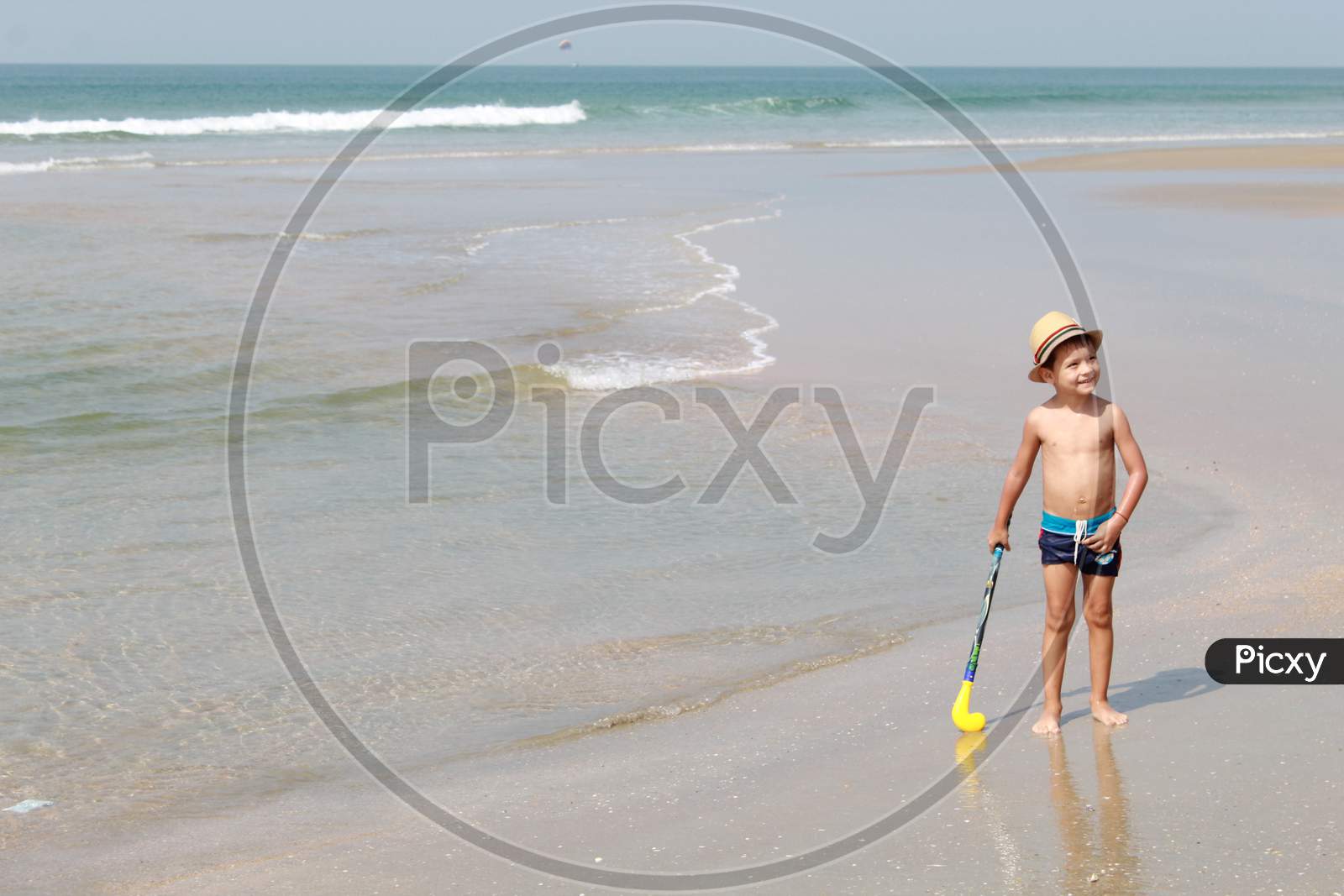 boy playing on the beach