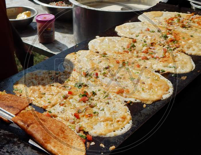 Close-up view of making of Indian street  food Masala Dosa