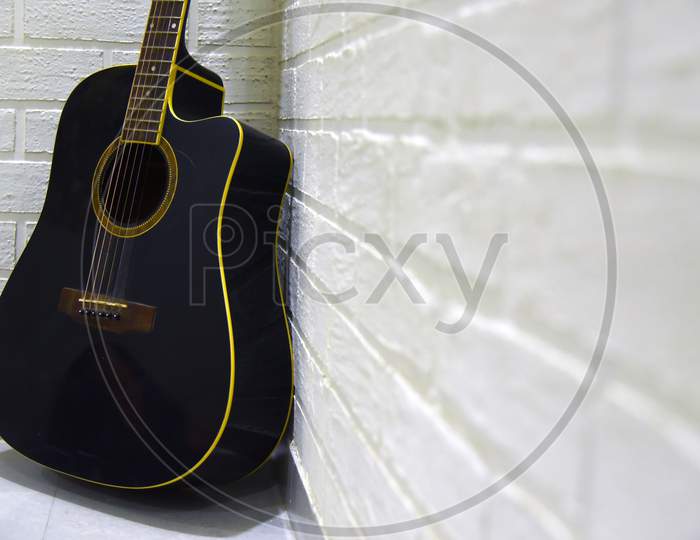 Old Guitar Close Up.Guitar Wallpaper . Different Angle Guitar Photo