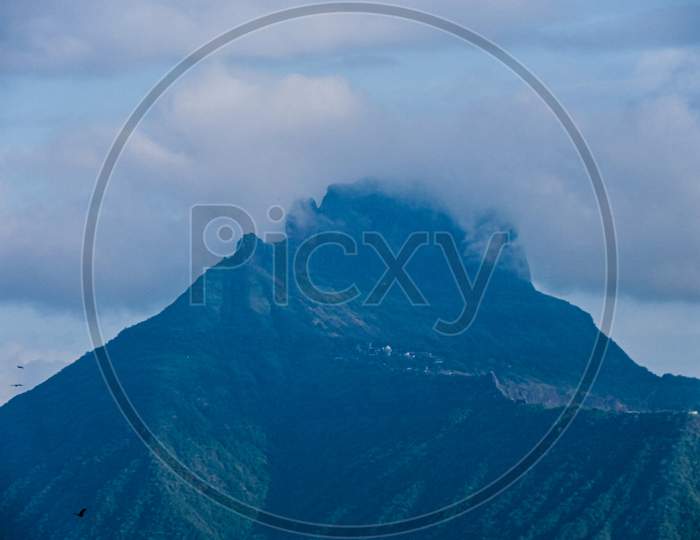 Landscape Photo Of A Mountain With Clouds
