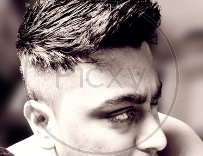 man with spike cut hairstyle