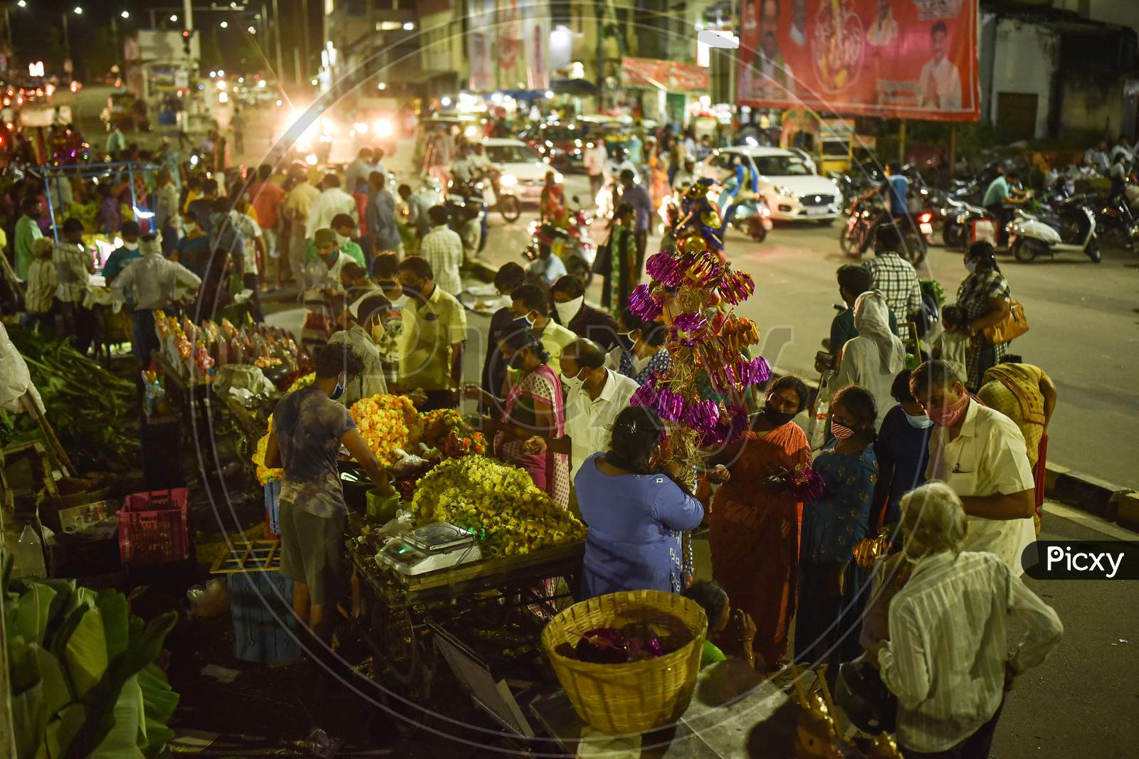 People Buy Pooja Essentials On The Eve Of Ganesh Chaturthi Festival, In Vijayawada On August 21, 2020.