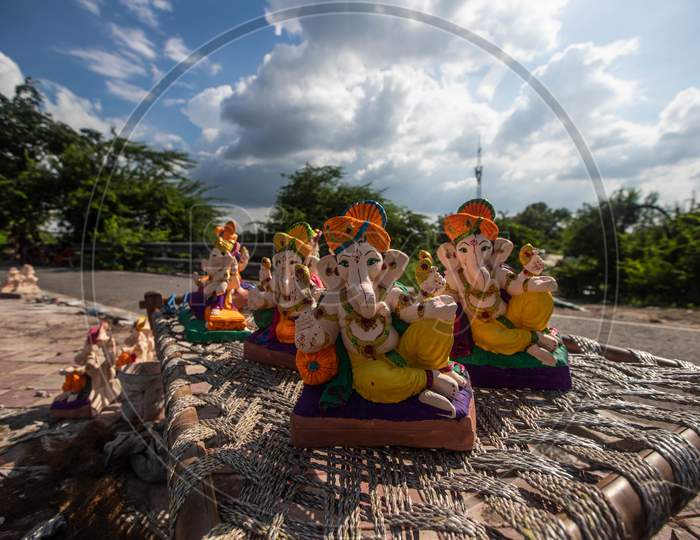 Idols of Ganesha, displayed for sale during Ganesh Chaturthi along the roadside in New Delhi on August 22, 2020.