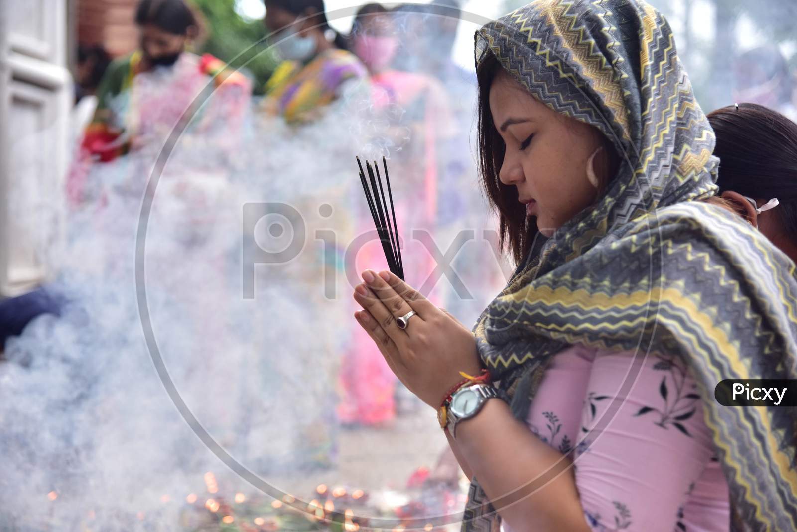 Devotees  Offer Prayers To Lord Ganesha On The Occasion Of  Ganesh Chaturthi Festival In Nagaon District Of Assam On August 22,2020.
