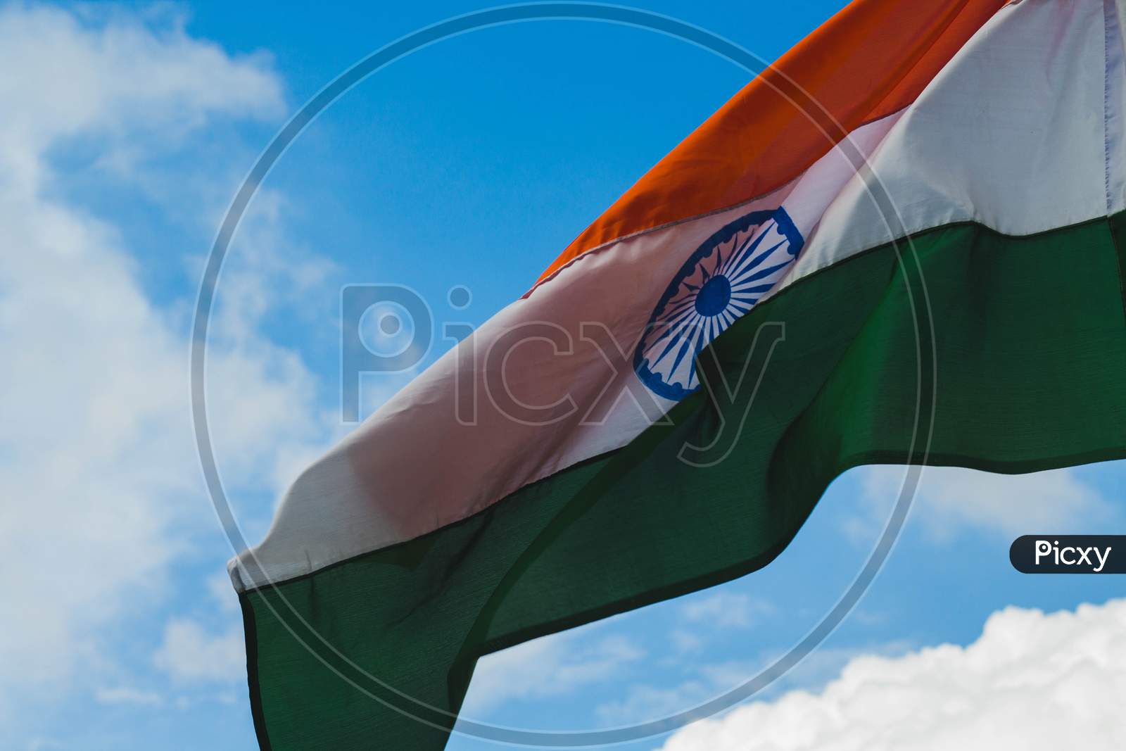 Tricolour Indian flag under blue sky