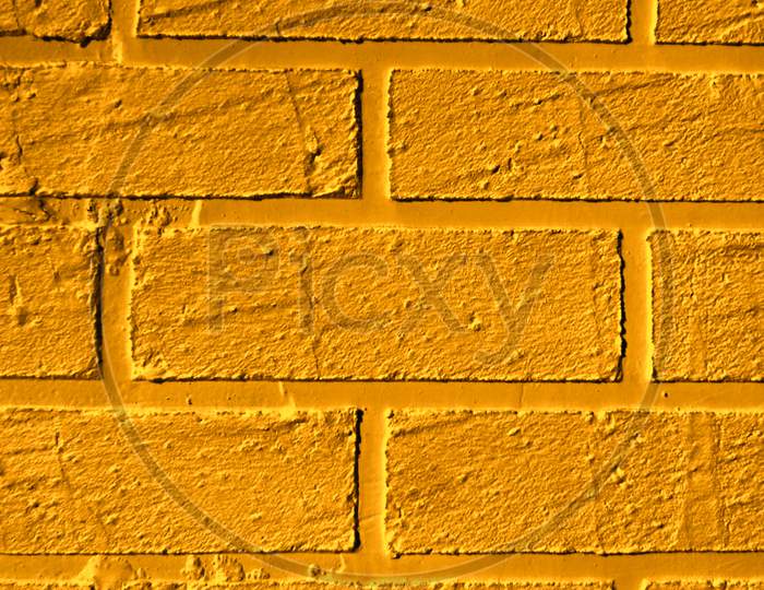 Close Up Of Golden Shade Brick Wall Texture Background