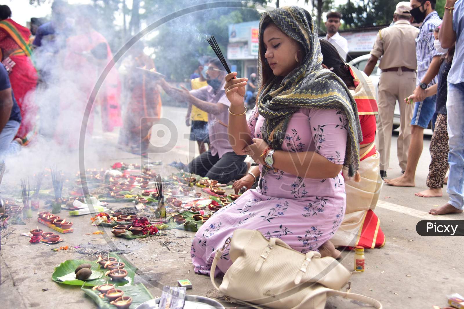 Devotees Offer Prayers To Lord Ganesha On The Occasion Of  Ganesh Chaturthi Festival In Nagaon District Of Assam On August 22,2020.
