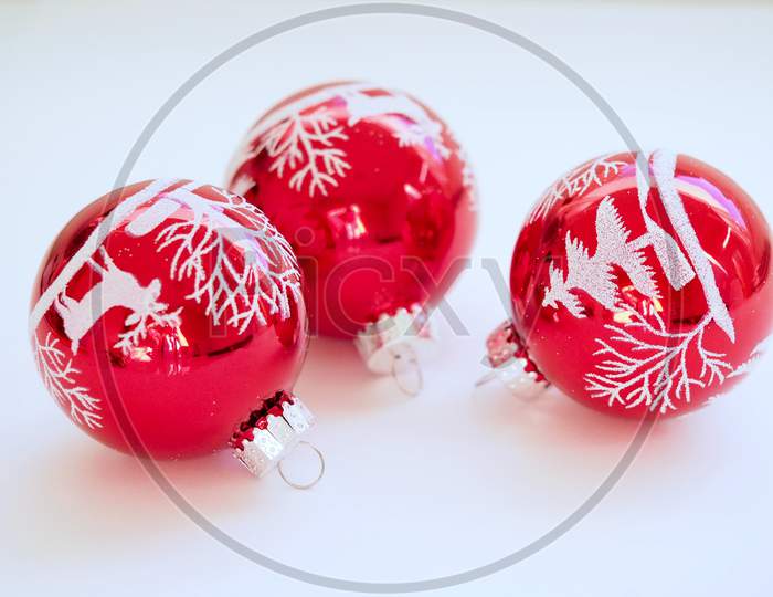 3 Red and White Christmas Ornament In White Background.