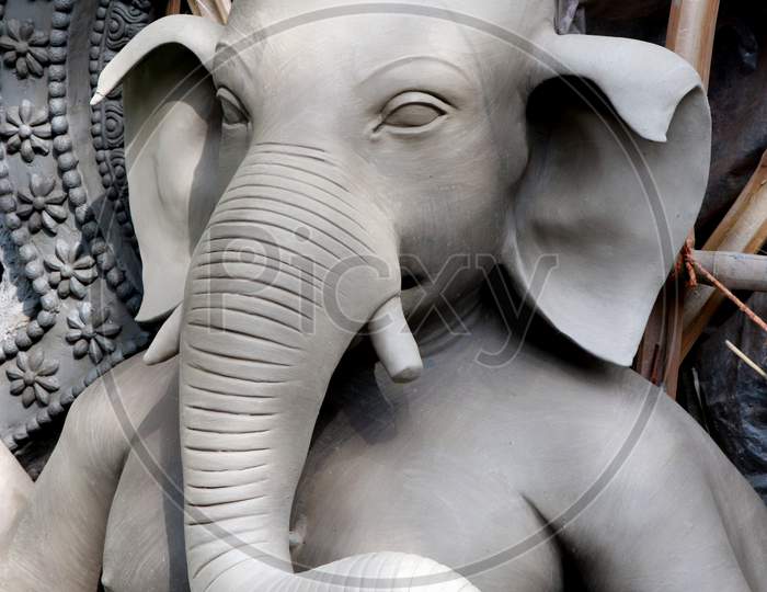 Close up shot of unfinished or Unpainted Lord Ganesha Idol