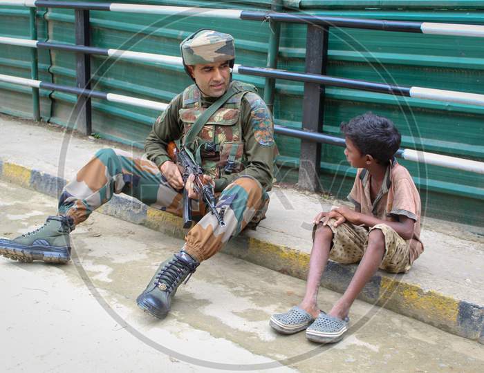 Soldier and poor boy