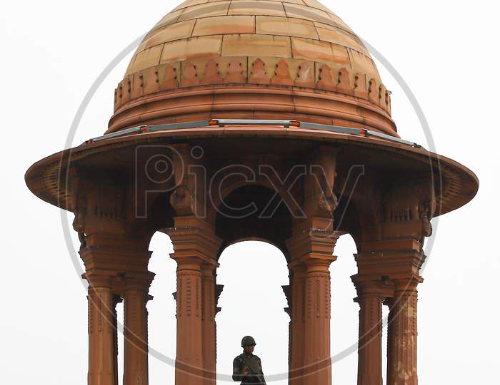 A security standing guard near Rashtrapati Bhavan