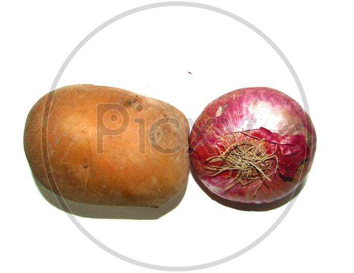 Onion and potato on white background