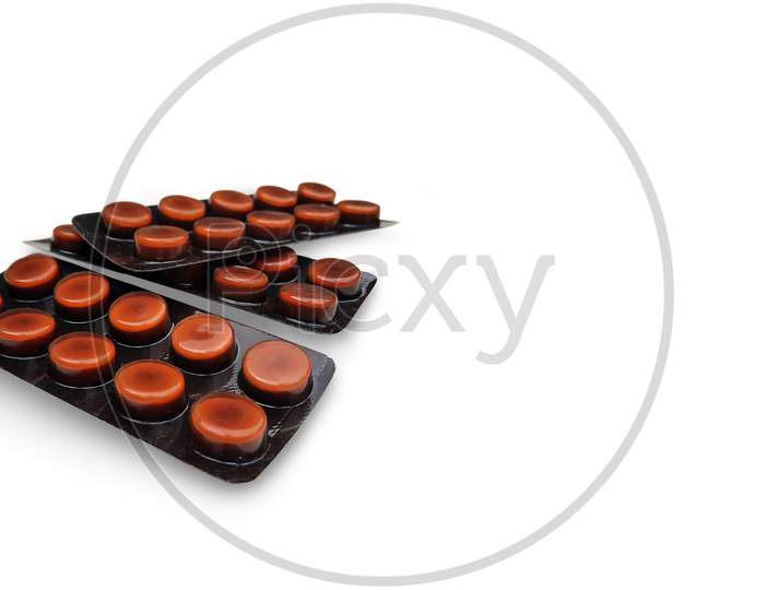 Pack Of Medical Tablets Isolated In White