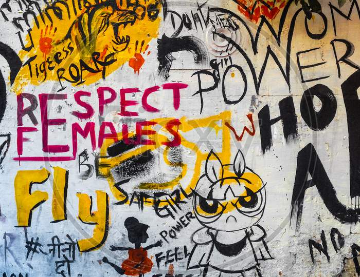 Graffiti or a wall art on women empowerment, crime against them and respect