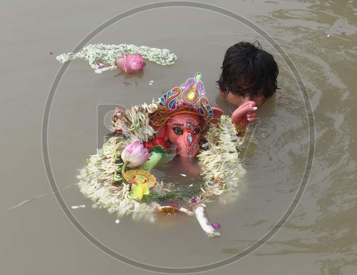 Ganesh idol immersion in the Ganges river at Bagbazar Ghat in Kolkata On August 23 2020