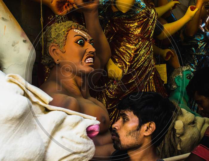 Goddess Durga being brought to life at Kumartuli