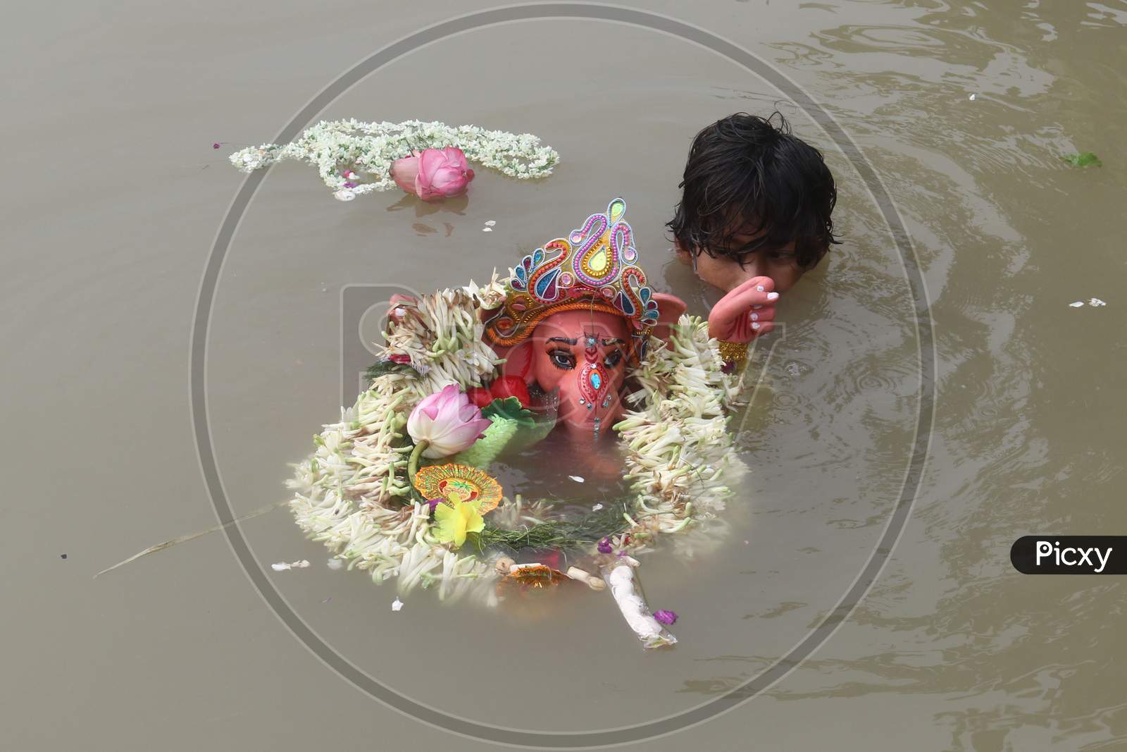 Ganesh idol immersion in the Ganges river at Bagbazar Ghat in Kolkata On August 23 2020