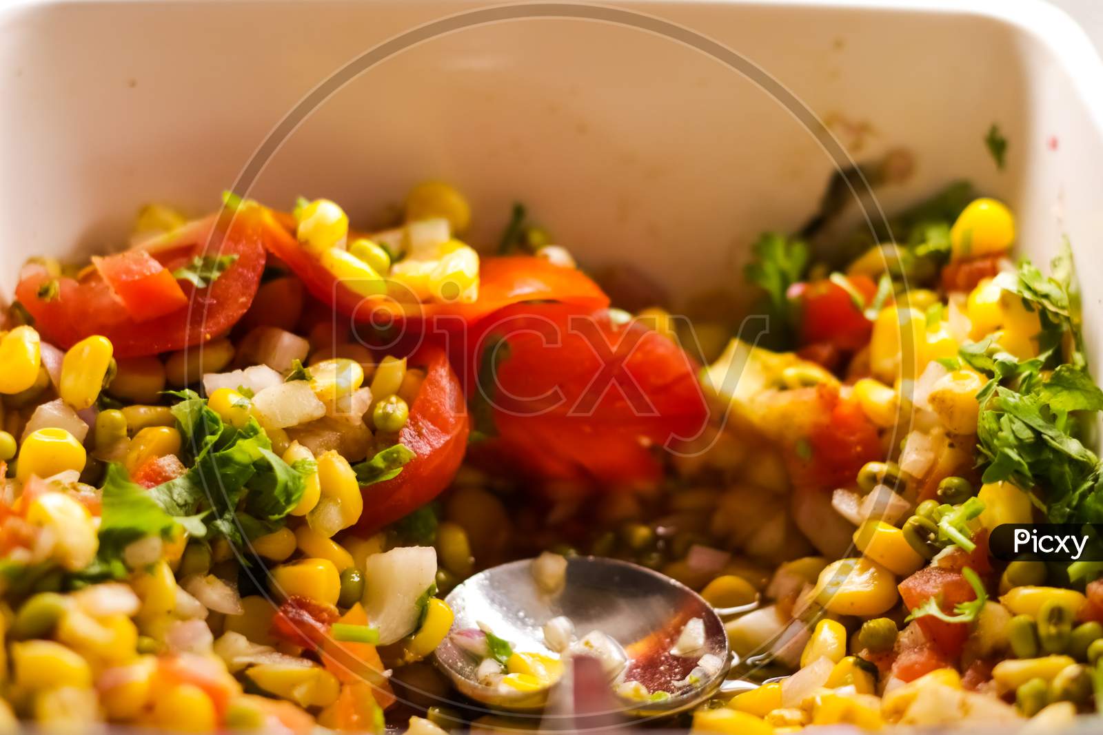 Close Up Photo Of Continental Vegetable Corn Salad In A Bowl