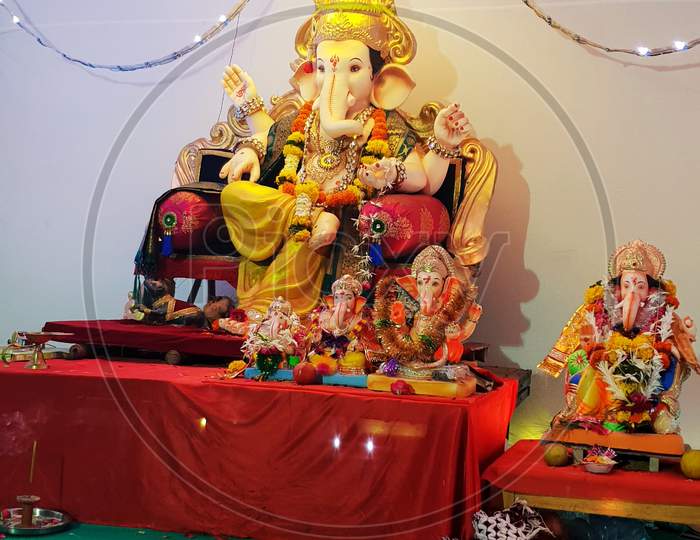 Beautiful Ganesh Murti On The Table. Colourful Ganesh Murti.