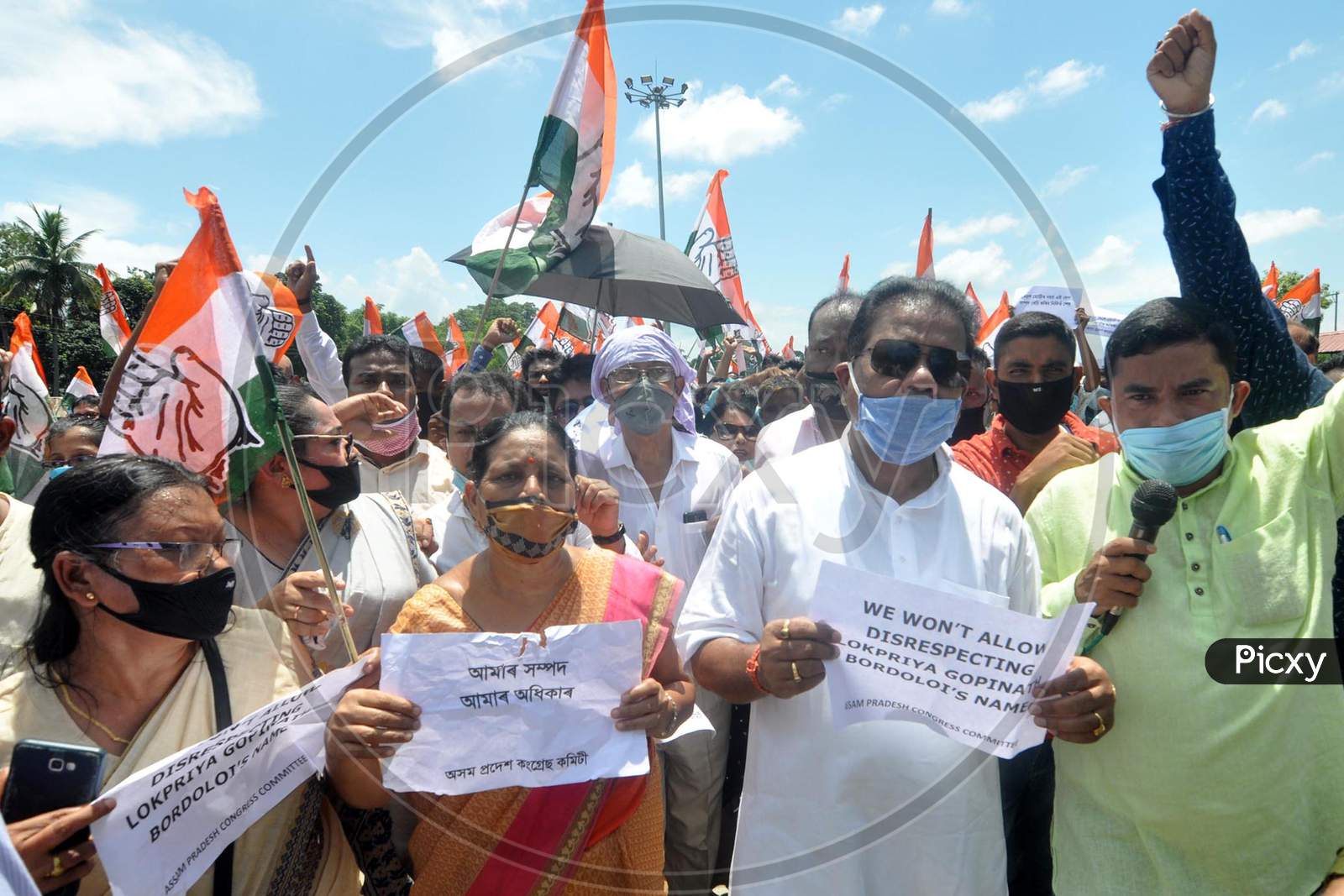 Senior Congress leaders with APCC members stage a protest over Centre's approval to lease three airports, Jaipur, Guwahati and Thiruvananthapuram, under the public-private partnership (PPP) model, outside LGBI Airport in Guwahati, Monday, Aug. 24, 2020.