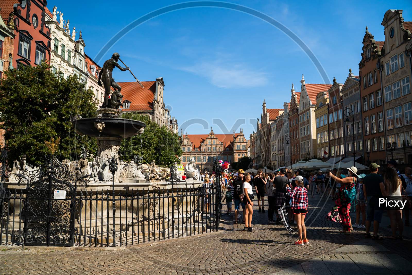 Gdansk, North Poland - August 13, 2020: People Taking Pictures Next To Neptune'S Fountain Touristic Spot In Main Square City Center During Covid 19