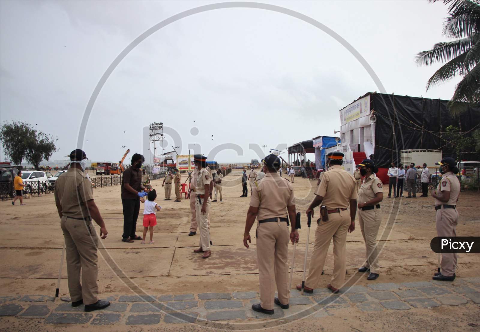 Police personnel stand guard outside Girgoan Chowpatty, during the Ganesh Chaturthi festival in Mumbai, India on August 23, 2020.