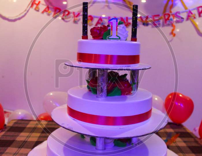 First Anniversary Celebration. First Anniversary Cake With Beautiful Decoration. Wedding Celebration.