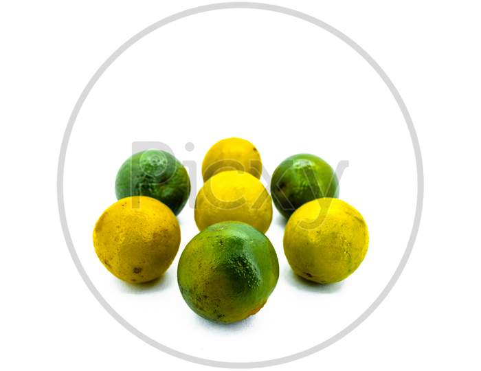 Close Up Macro View Green Yellow Ripe Fresh Juicy Lemon Orange Designed Decorated On Isolated White Background Clipping Path, Copy Space for Text. Cool food pattern texture noise with selective focus.