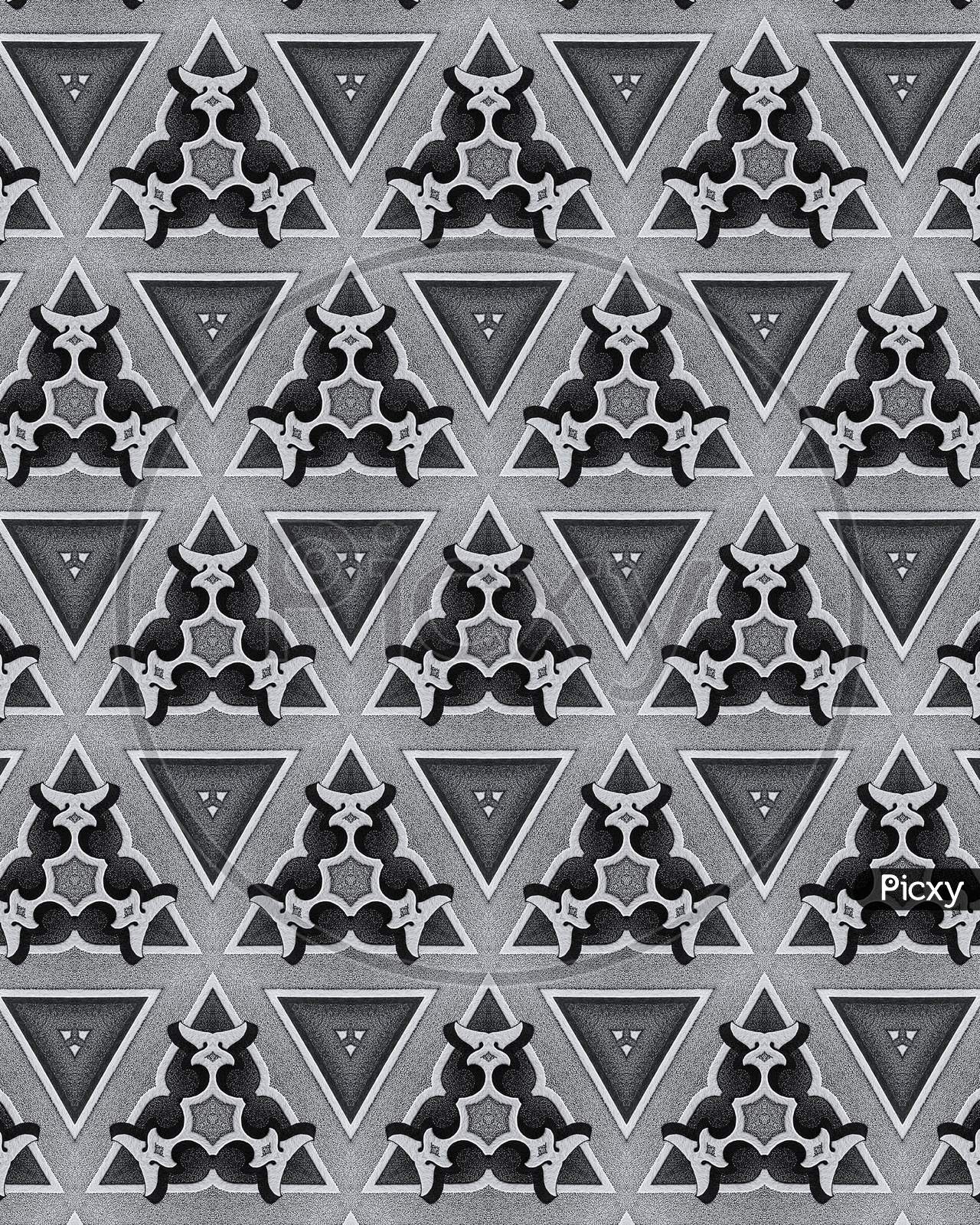 Elegant And Ornamental Dark Grey Symmetrical Designs On Solid Sheet Of Wallpaper Concept Of Home Decor And Interior Designing