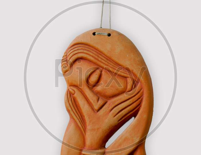 Human Face Handicraft Made From Clay. Natural Terracotta Color, Isolated And White Background. Graphics Resource.