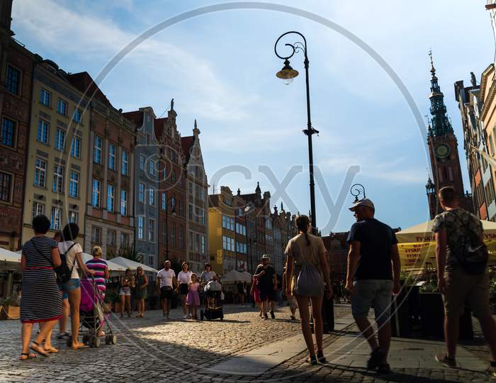 Gdansk, North Poland - August 13, 2020: Tourists Walking Next To Neptune'S Fountain Touristic Spot In Main Square City Center During Covid 19 Pandemic