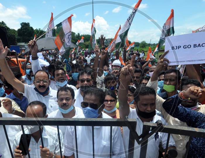 Senior Congress leaders with APCC members stage a protest over Centre's approval to lease three airports, Jaipur, Guwahati and Thiruvananthapuram, under the public-private partnership (PPP) model, outside LGBI Airport in Guwahati, Monday, Aug. 24, 2020.