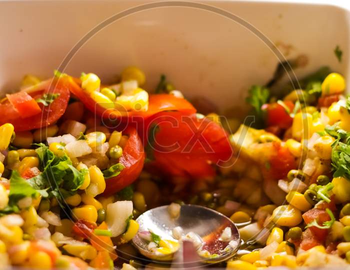 Close Up Photo Of Continental Vegetable Corn Salad In A Bowl