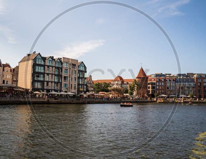 Gdansk, North Poland - August 13, 2020: Wide Angle Shot Of Summer Around Motlawa River Adjacent To Beautiful European Architecture Near Baltic Sea