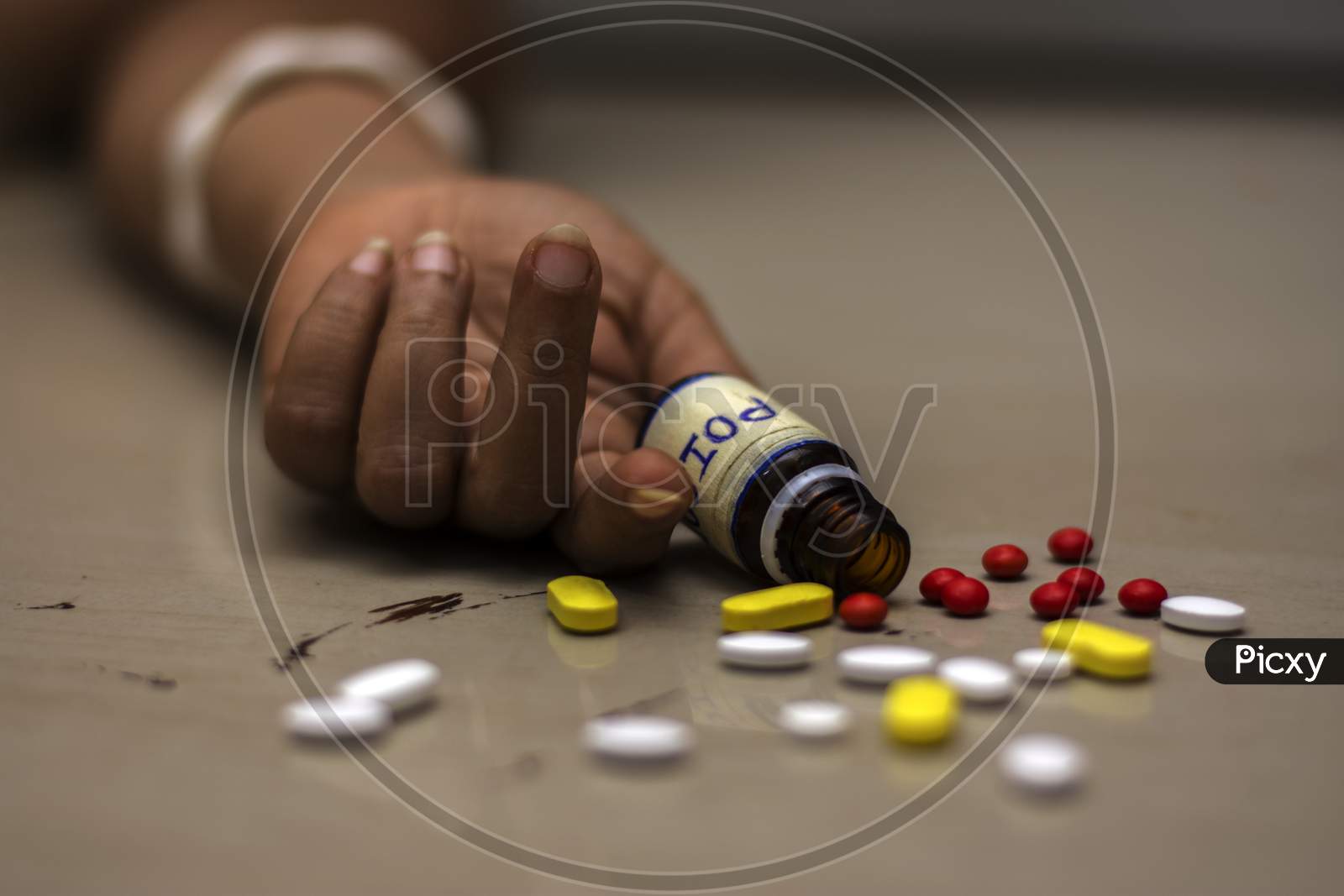 Bottle Of Poison Pills In A Female'S Hand Committing Suicide By Overdosing Of Medication.