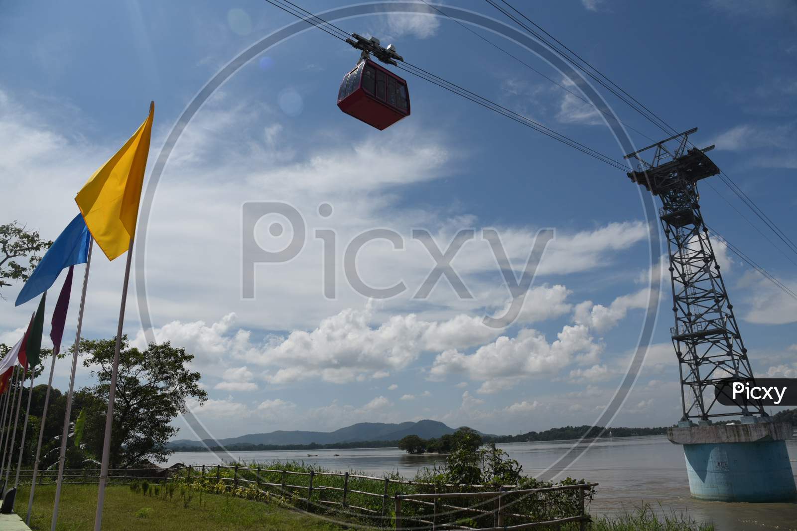 People Travel In Cable Car Cabins In India's Longest River Ropeway Over The River Brahmaputra, In Guwahati On August 24, 2020.