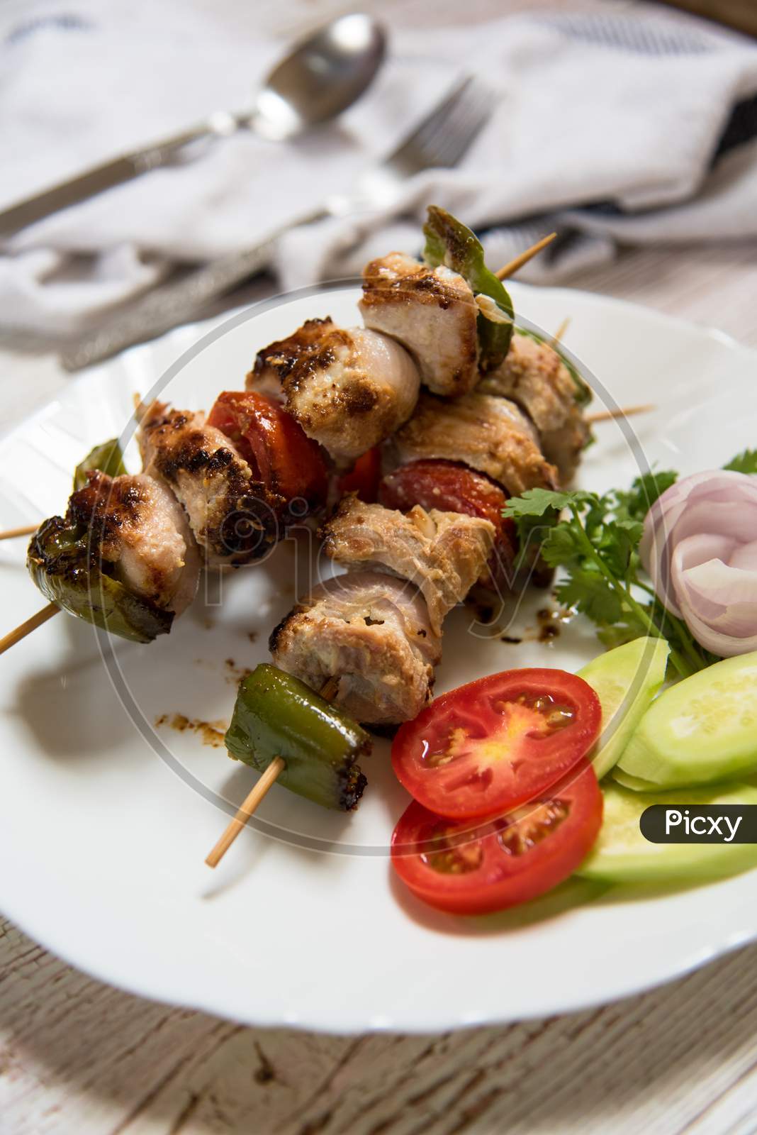 Heap of chicken kebab meat on a plate