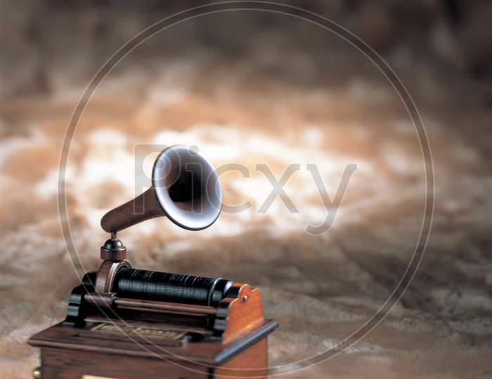 A vintage microphone with creative background