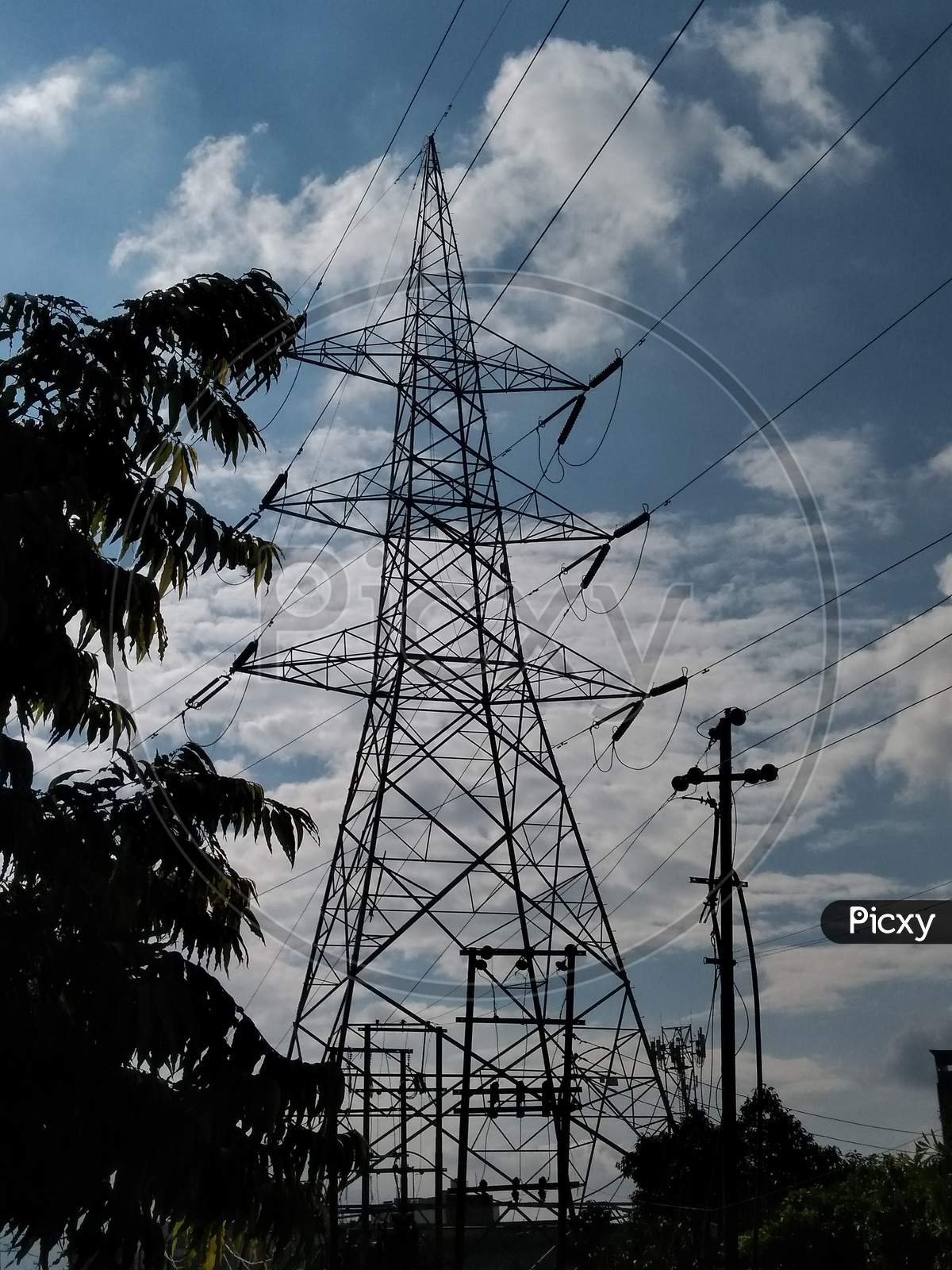 A picture of electric tower with sky background