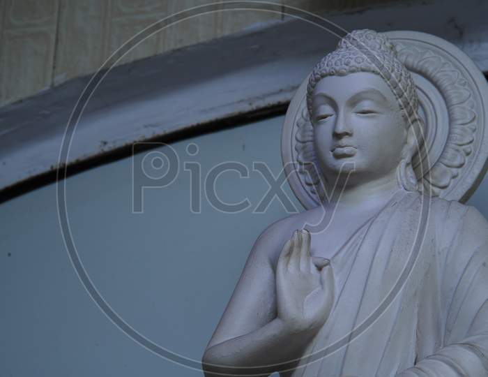 Lord Buddha White Statue Closeup