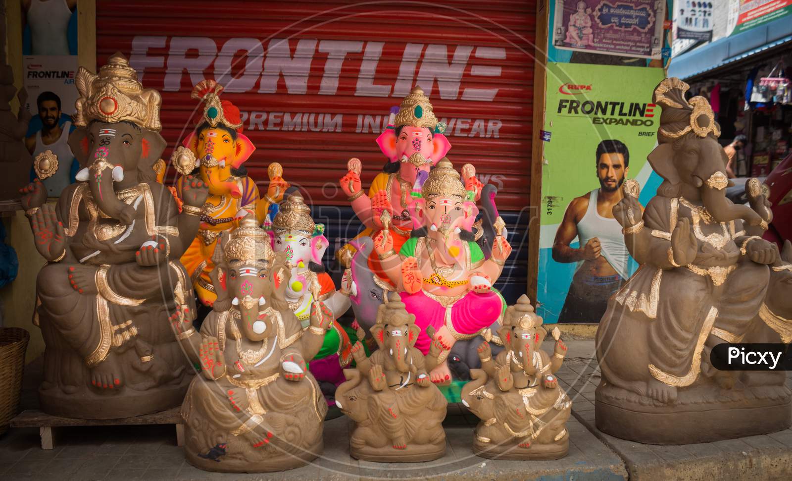 Ganesha idols in all shapes,sizes and colors at the Market place in Mysuru,Karnataka/India.