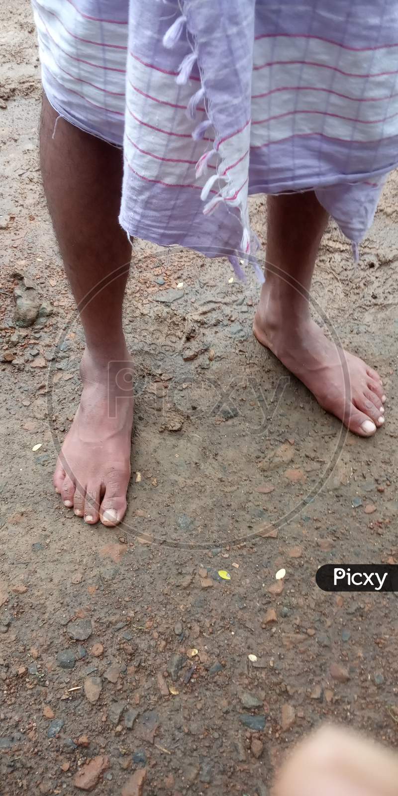 Human leg or ancle  foot on the ground
