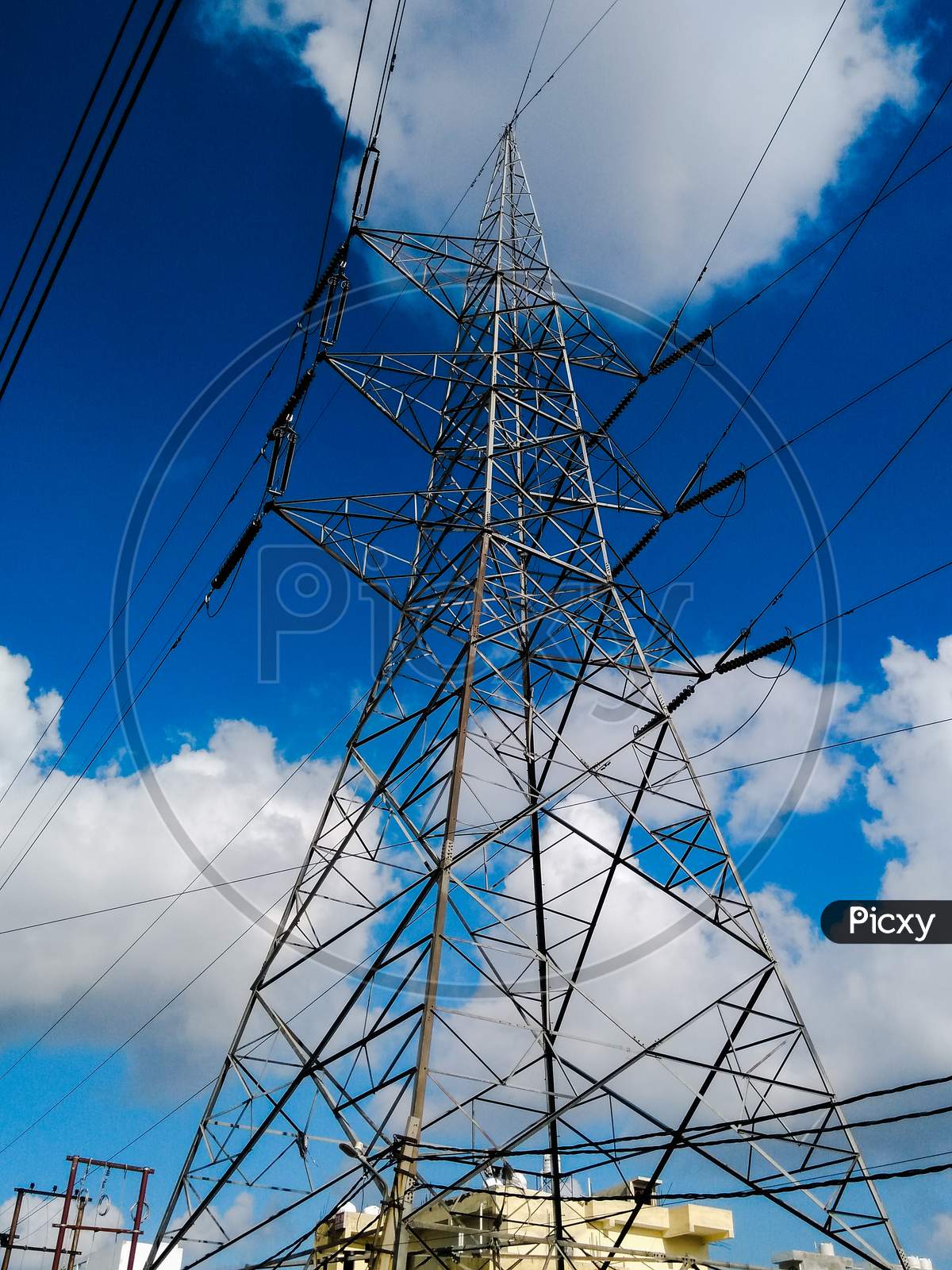 A picture of electric tower with sky background
