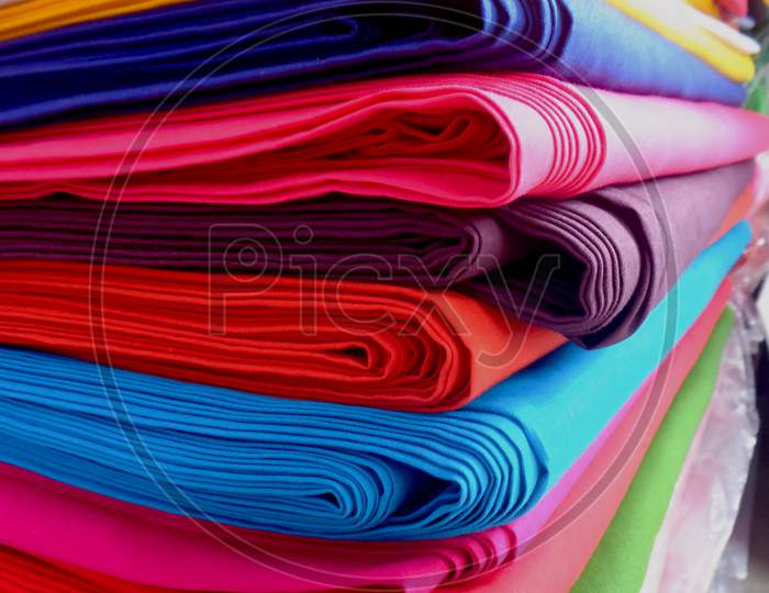 Bundles Of Colorful Cloth Arranged By Folding