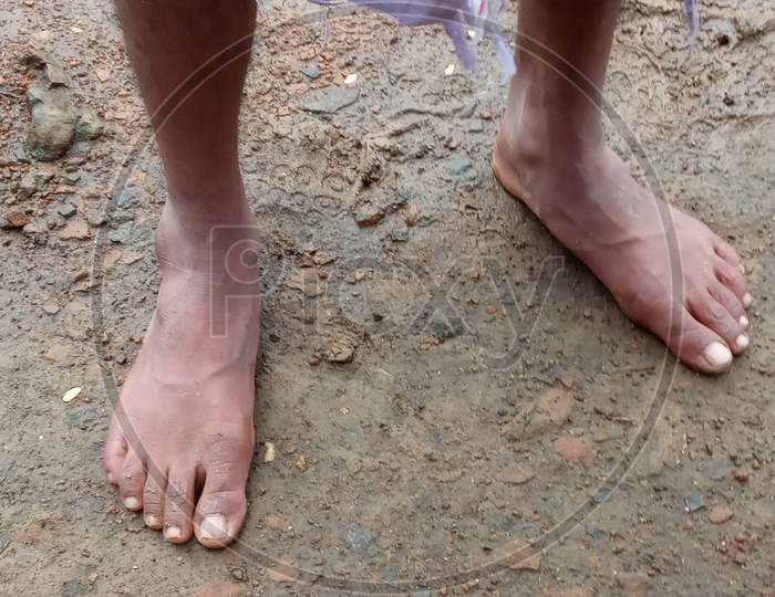 Human leg or ancle  foot on the ground